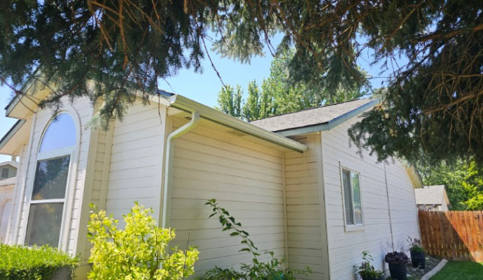 A gutter installed on the roof of a house