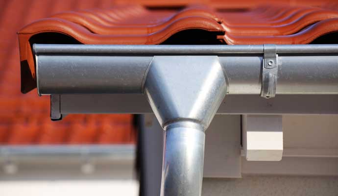 An aluminum gutter system installed on a building.