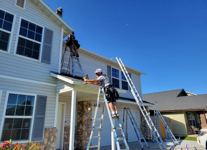 Professional installing gutter