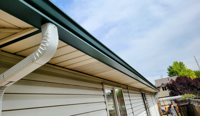 A side of a house with installed soffits.